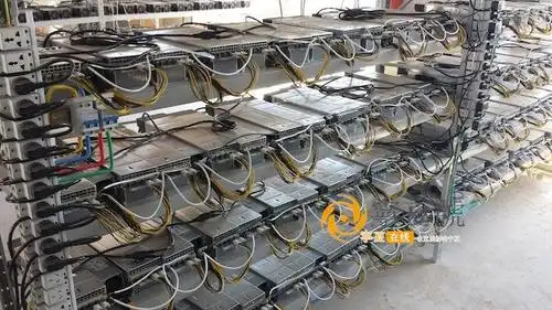 Expansive wind-powered cryptocurrency mining farm under blue sky