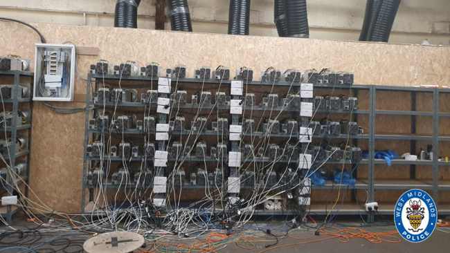 A modern mining farm showcasing multiple mining rigs